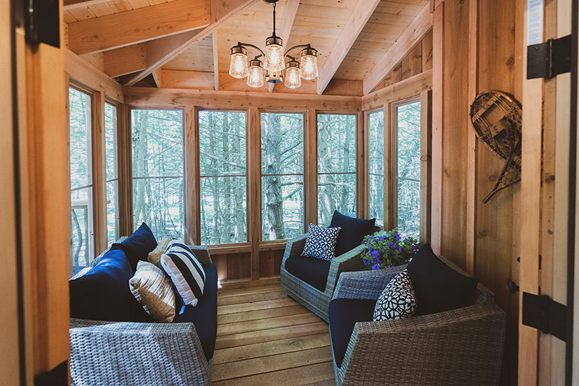 The woods maine treehouse porch luxury - Luxe Digital